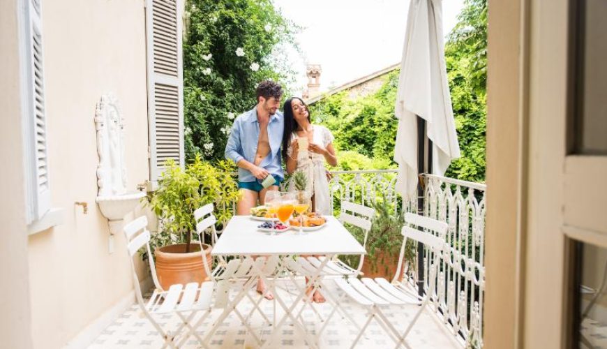 Couple having breakfast in a Villa