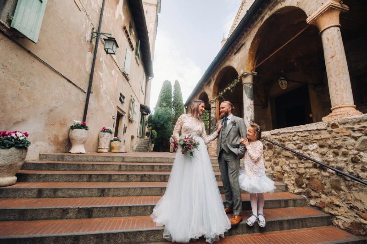 Happy young family on  wedding day