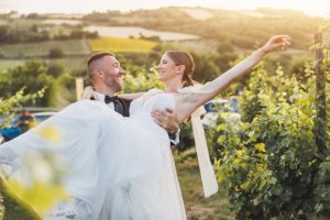 Happy couple wed at a vineyard