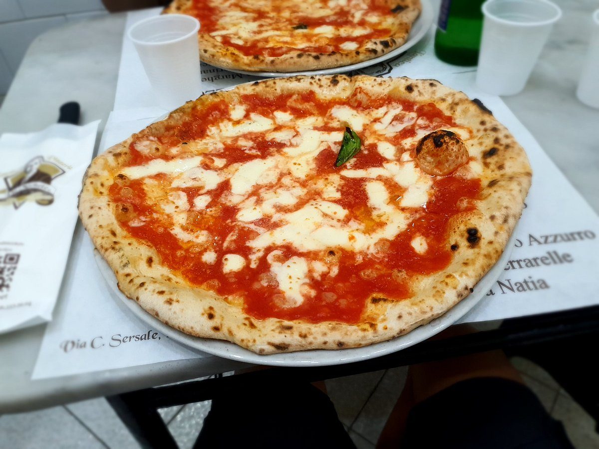 Pizza served at Antica Pizzeria da Michele in Naples, Italy