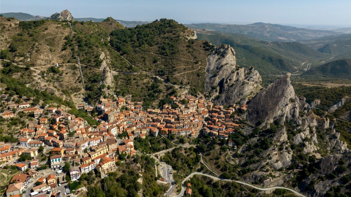 Aerial view of Castelmezzano, showcasing its picturesque architecture nestled among the mountains of Basilicata, Italy