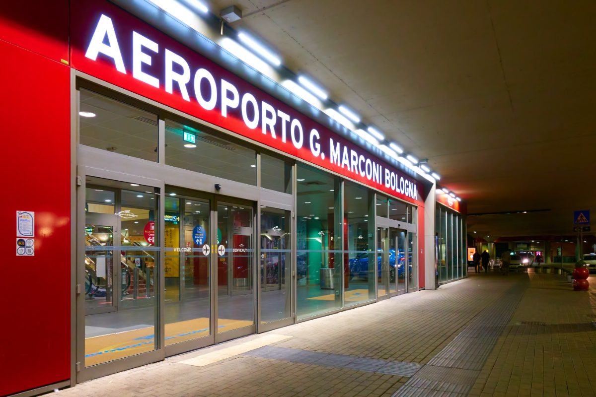 Sign and entrance of the Bologna Guglielmo Marconi Airport in Bologna, Italy