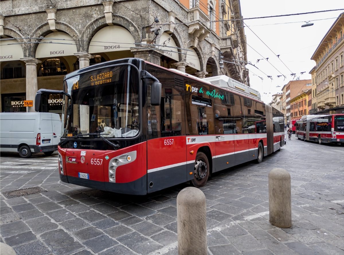 Close-up of the BredaMenarinibus M350 bus on a street in Bologna, Italy