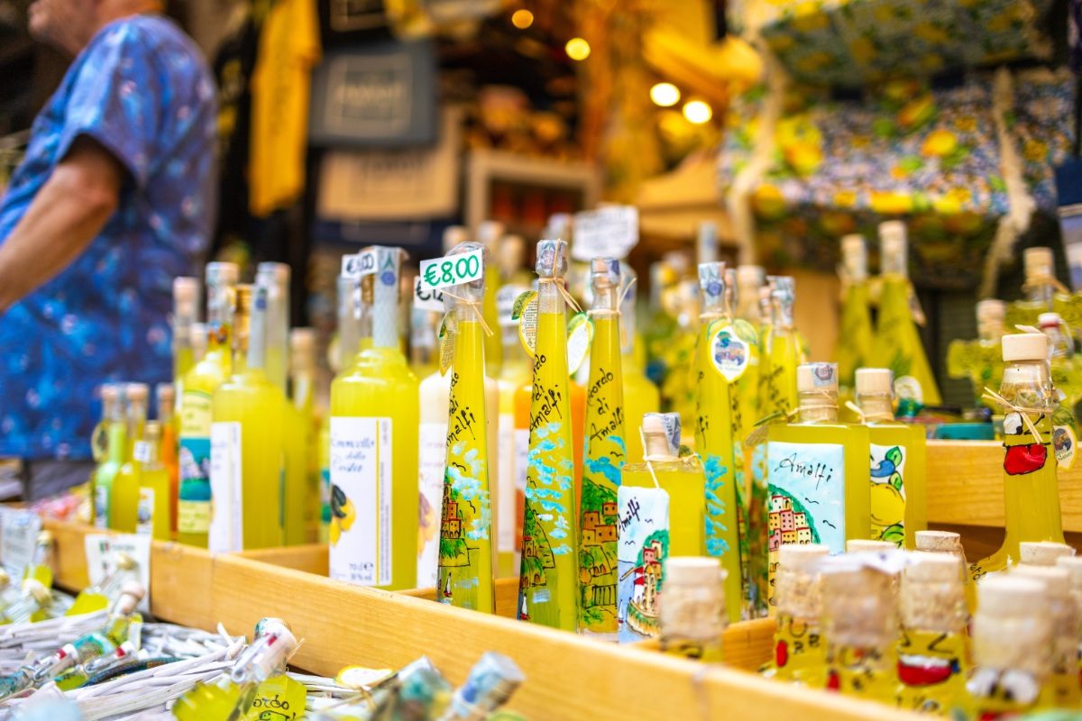 Close-up of limoncello bottles at a street market on the Amalfi Coast in Italy