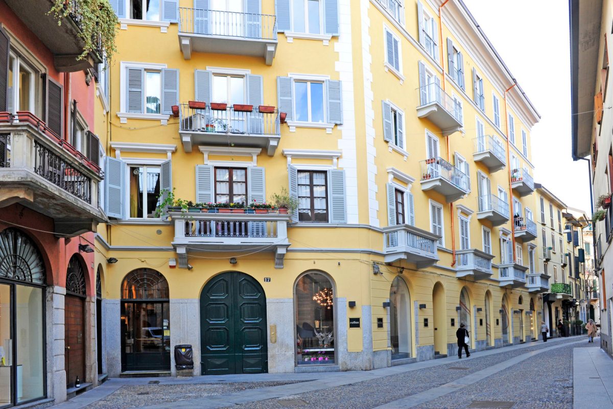 Street and establishments in Brera district, Milan, Italy