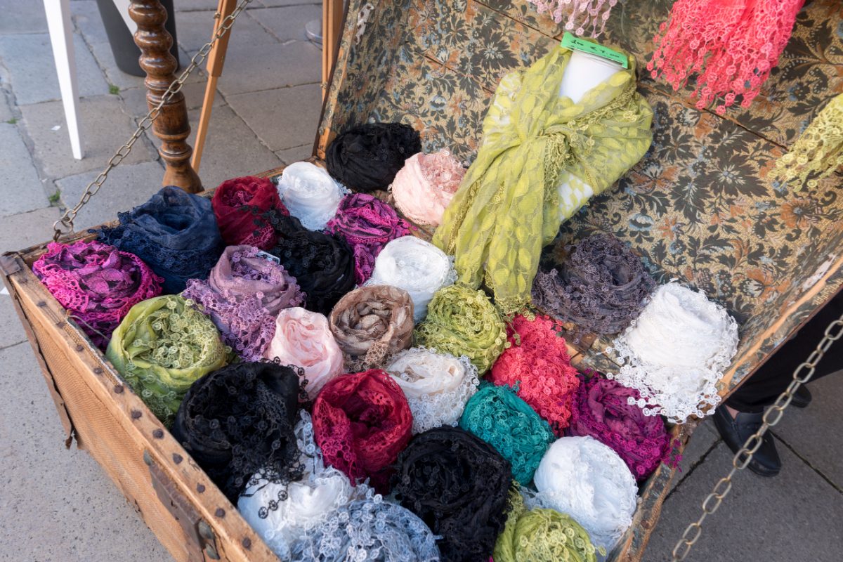 Close-up of lace scarves for sale in a store in Burano, Italy