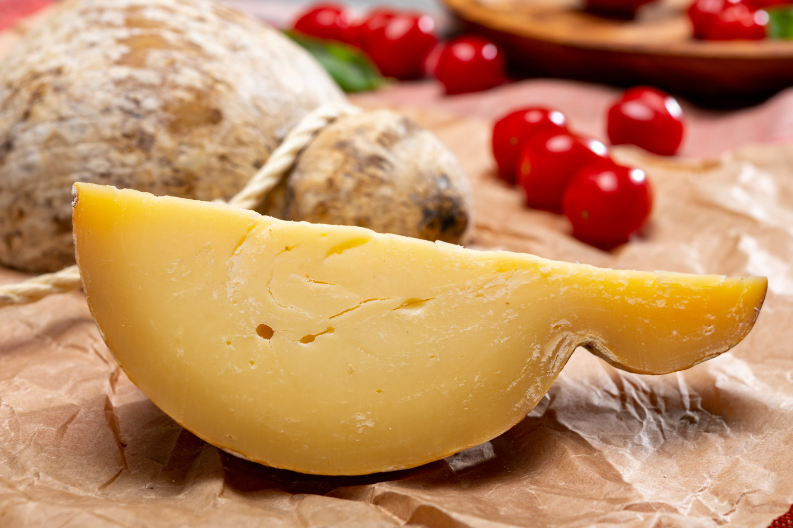 Slice and close-up of caciocavallo cheese in Apulia region