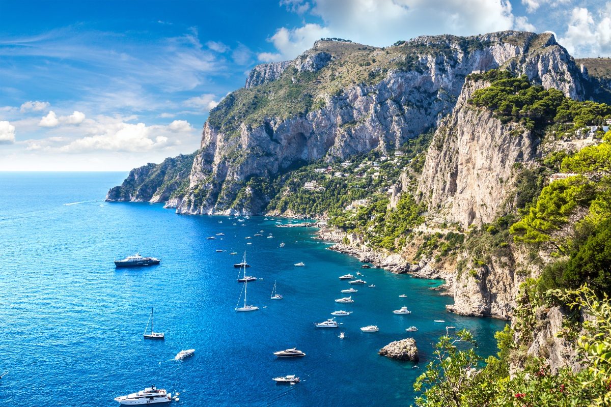 Panoramic view of the Capri island and boats in Italy