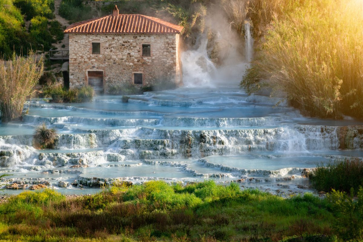 Panoramic view of the Cascate del Mulino natural spa and waterfalls in Italy