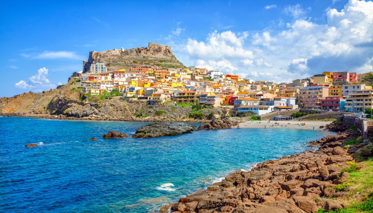 Panoramic view of colorful houses in Castelsardo town, Sardinia, Italy