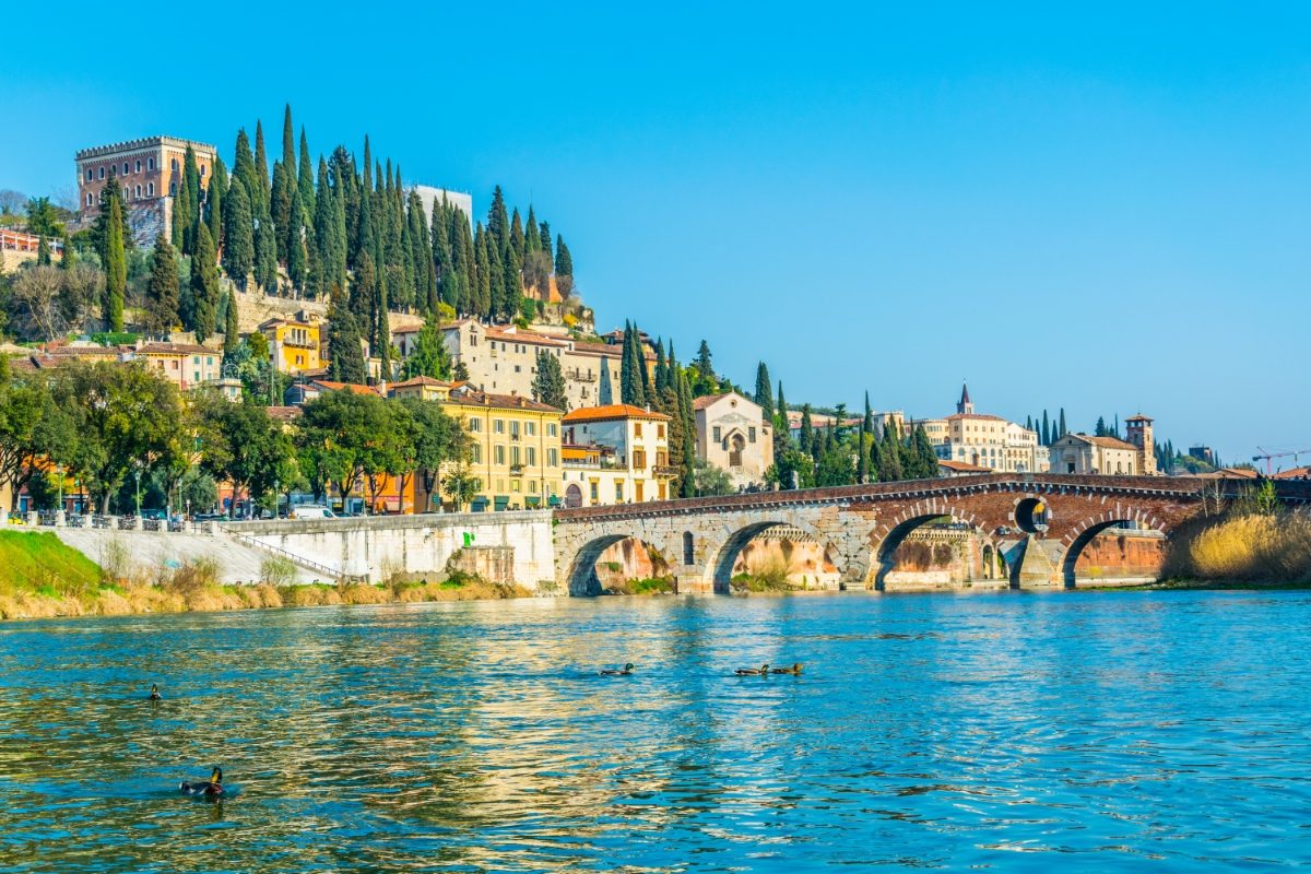 Panoramic view of the Castle San Pietro and the Ponte Pietra bridge over river Adige in Verona, Italy