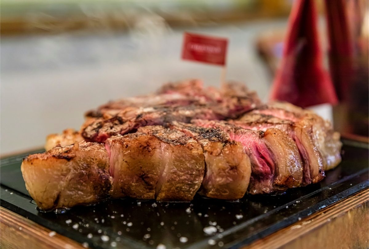 Close-up of the bistecca alla Fiorentina, a dry aged T-bone Florentine steak