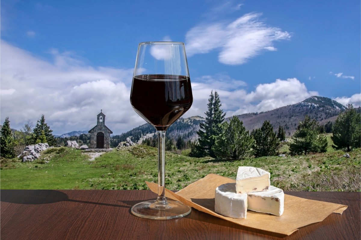 Traditional Italian glass of red wine in Dolomites, Italy