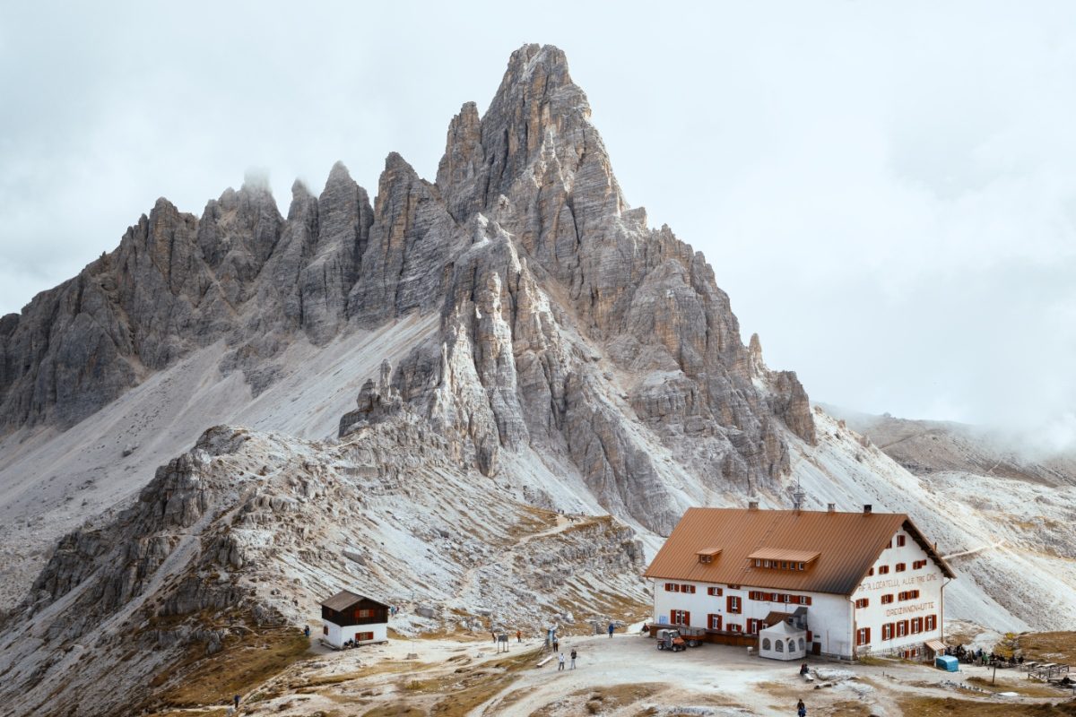 Scenic view of a mountain refuge rifugio nestled high in the Dolomites