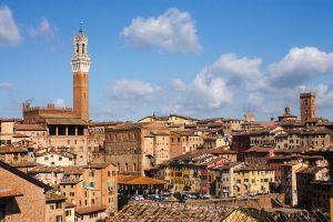 Aerial view downtown Siena, Italy cityscape and Torre del Mangia