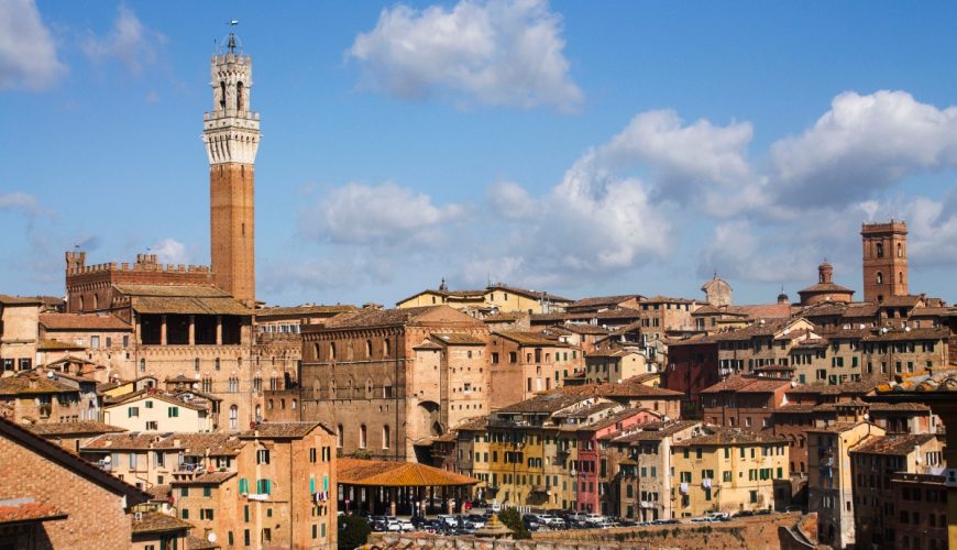 Aerial view downtown Siena, Italy cityscape and Torre del Mangia