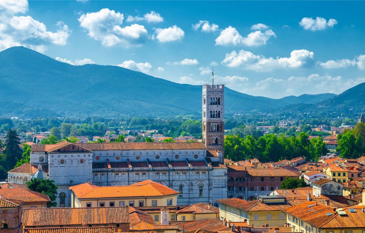 Exterior of the Duomo di San Martino San Martin cathedral bell tower and Lucca townscape in Lucca, Italy