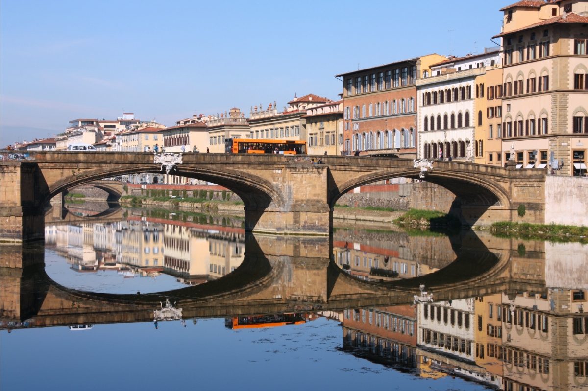 Bus passing by a bridge in Florence, Italy