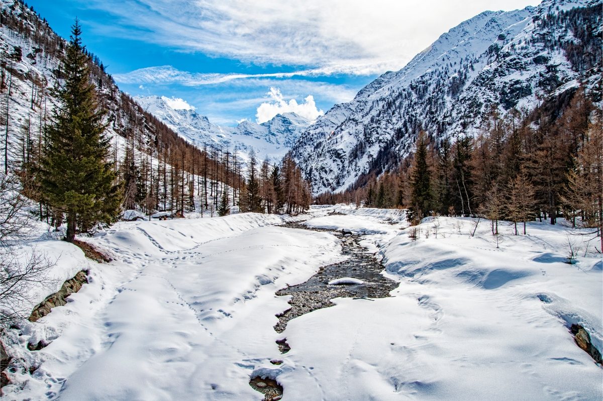 Snow-covered grounds and mountain winter landscape of Gran Paradiso National Park in Italy