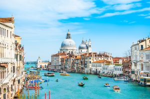 Panoramic view of the Basilica Santa Maria della Salute and Grand Canal in Venice, Italy