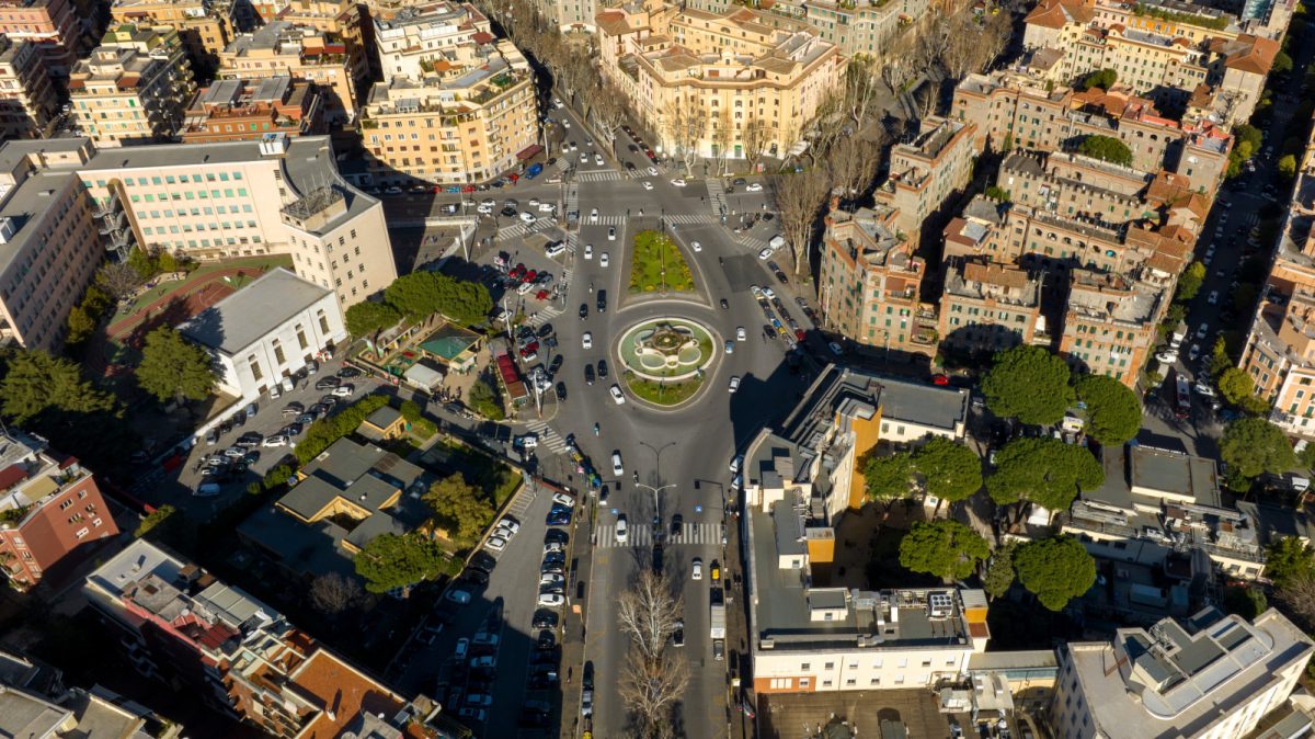 Aerial view of buildings and the traffic at the Heroes' Square in Rome, Italy