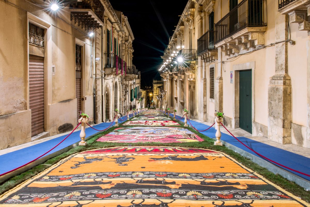 Floor filled with flower display for Infiorata Flower Festival  in Noto, Sicily