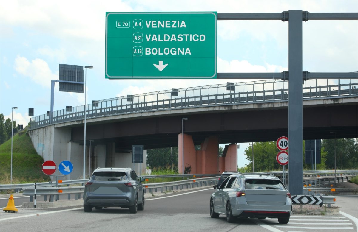 Cars passing through a bridge heading to Venezia Valdastico and Bologna in Italy