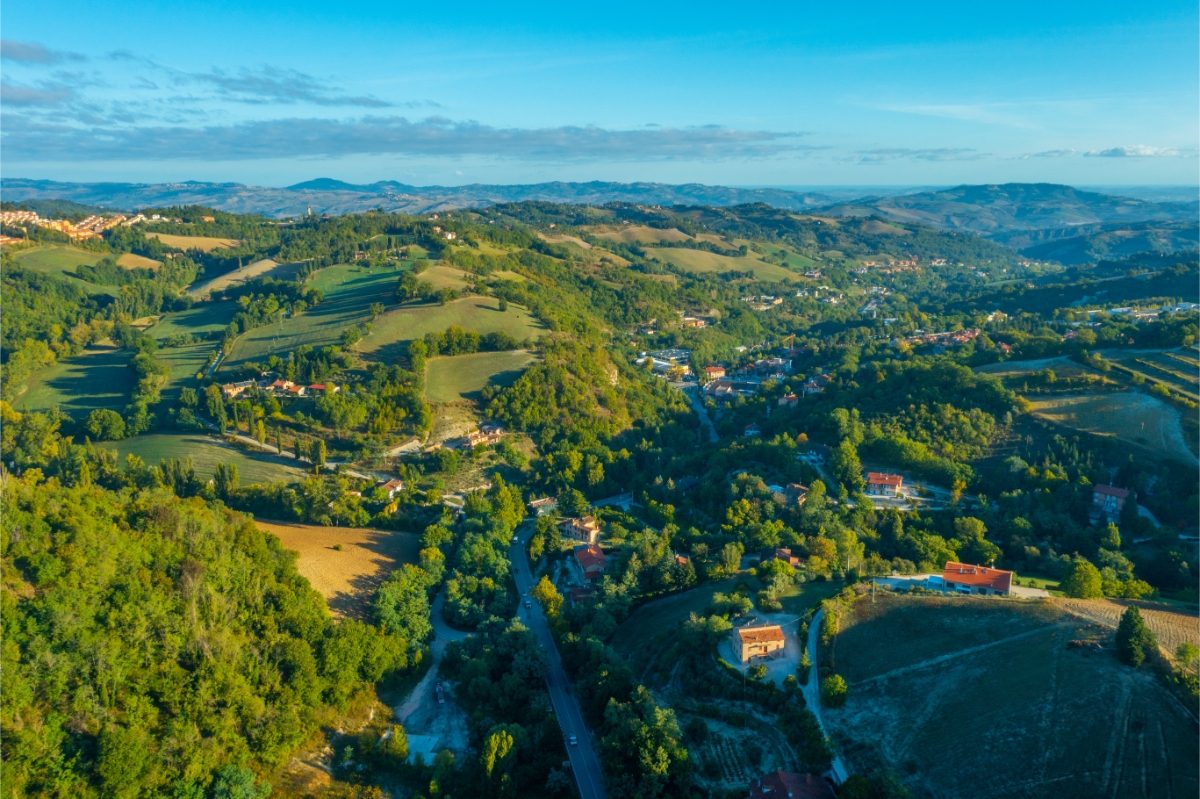 Scenic view of the Le Marche region's mountains near Urbino, Italy, showcasing lush greenery and rolling hills