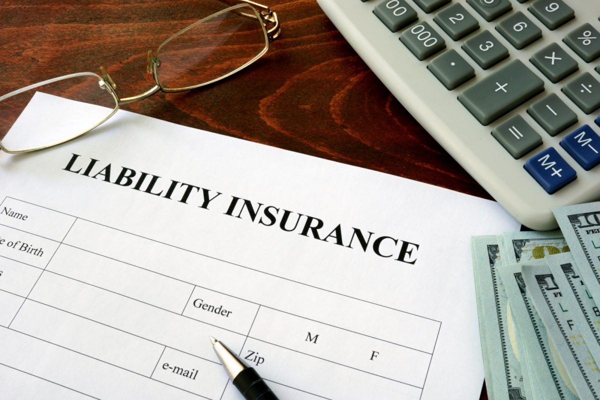 Liability insurance form on top of a wooden table