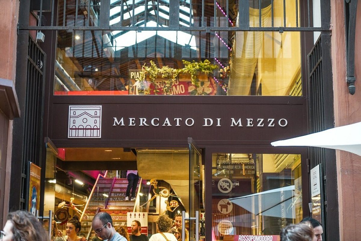 Sign and entrance of the Mercato di Mezzo in Bologna, Italy