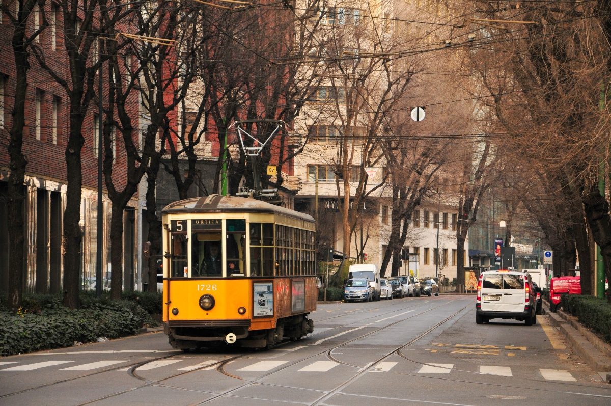 Vintage tram running in the streets of Milan, Italy