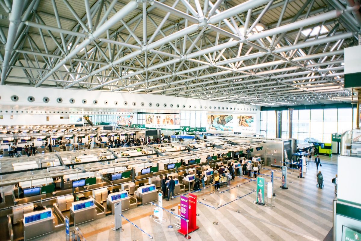 Interior of the Milan Malpensa Airport or the Milano Malpensa Airport departure hall in Milan, Italy