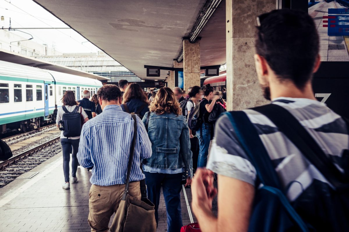 Crowd of people at Milan metro train station in Milan, Italy