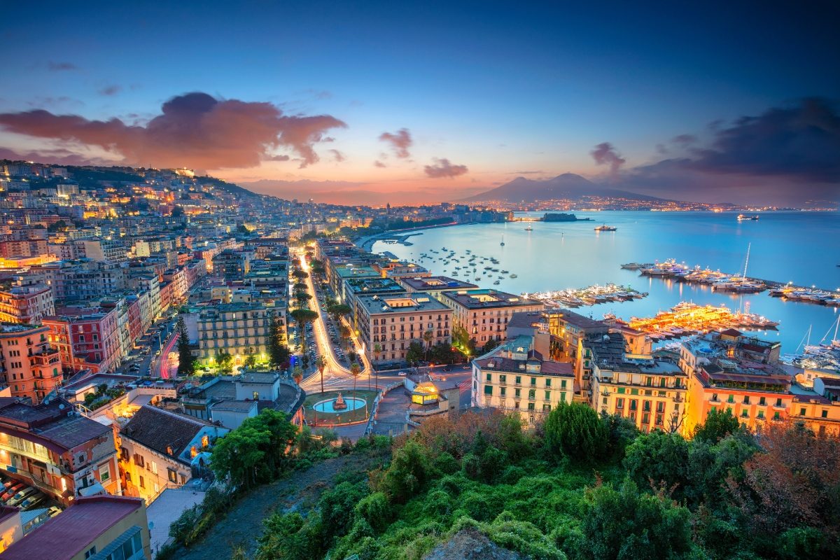 Aerial view of the Naples, Italy cityscape night lights