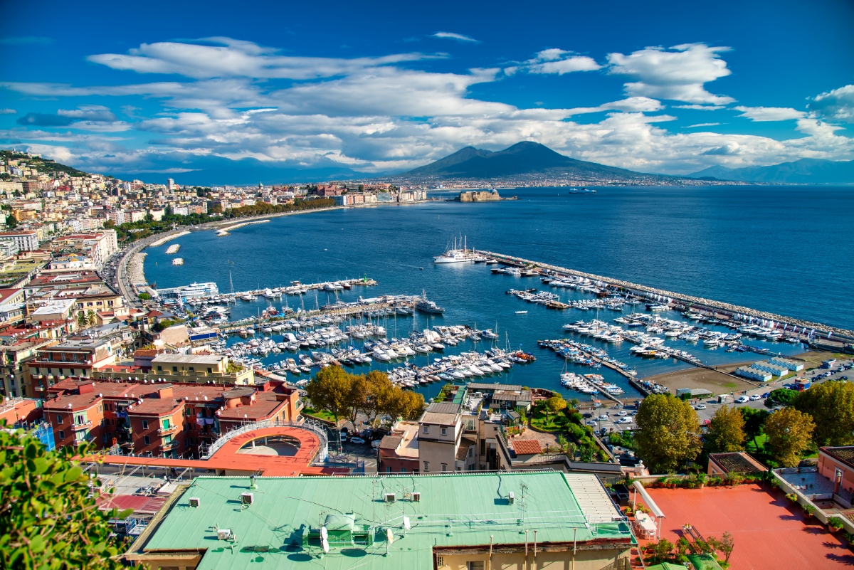 Aerial view of Naples coastal scenery, cityscape, and the Mount Vesuvius in the background