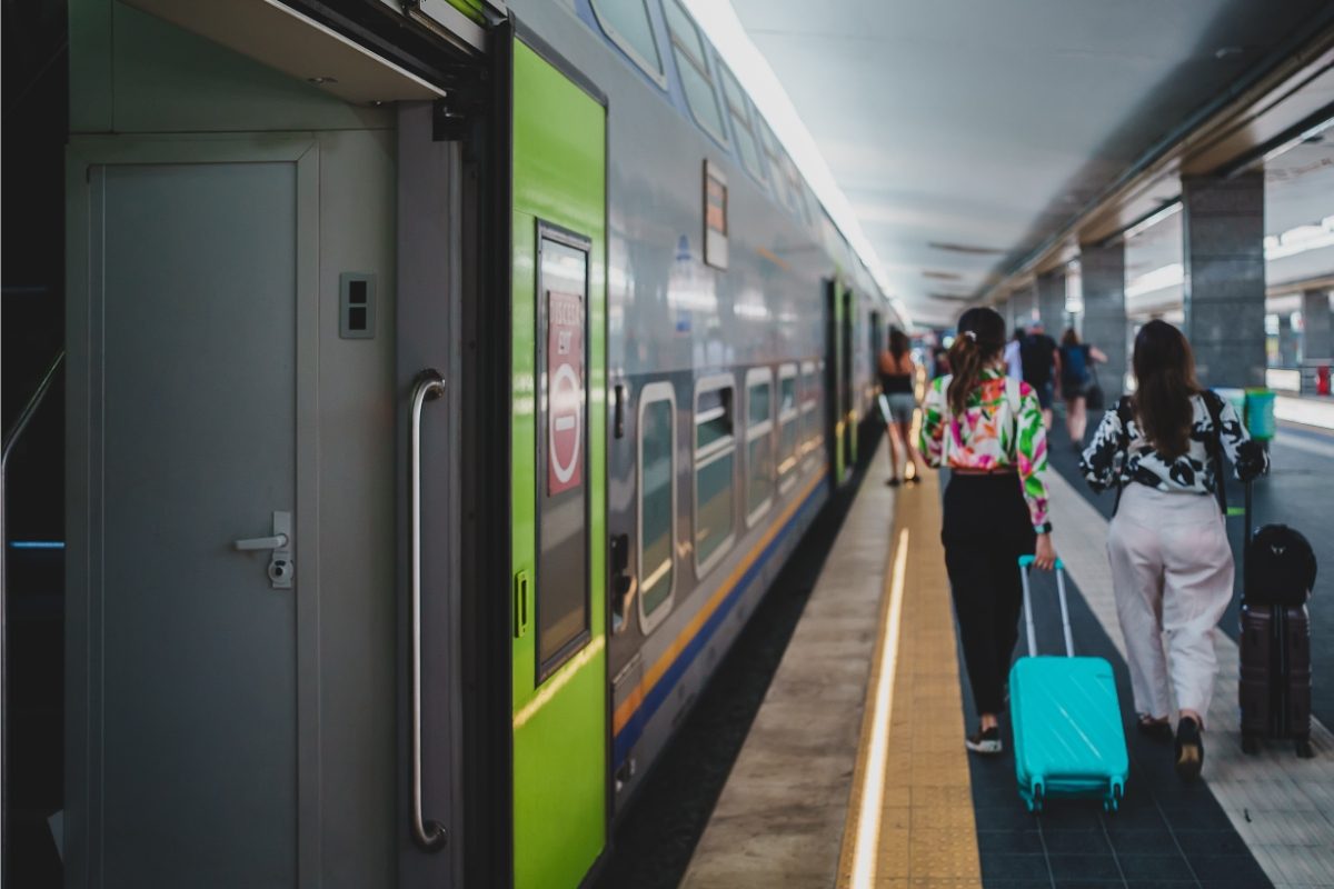 Naples, Italy train railway station and passengers