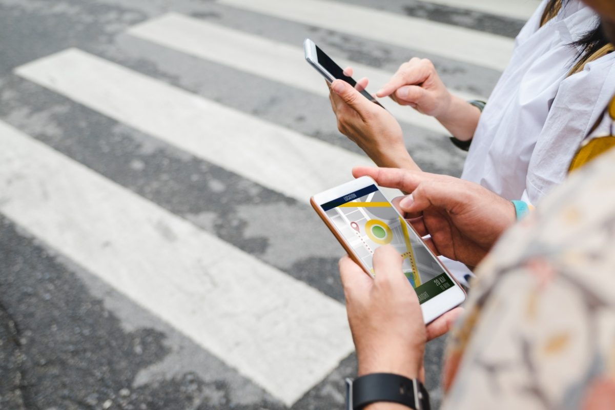 Man using an offline map with a mobile phone