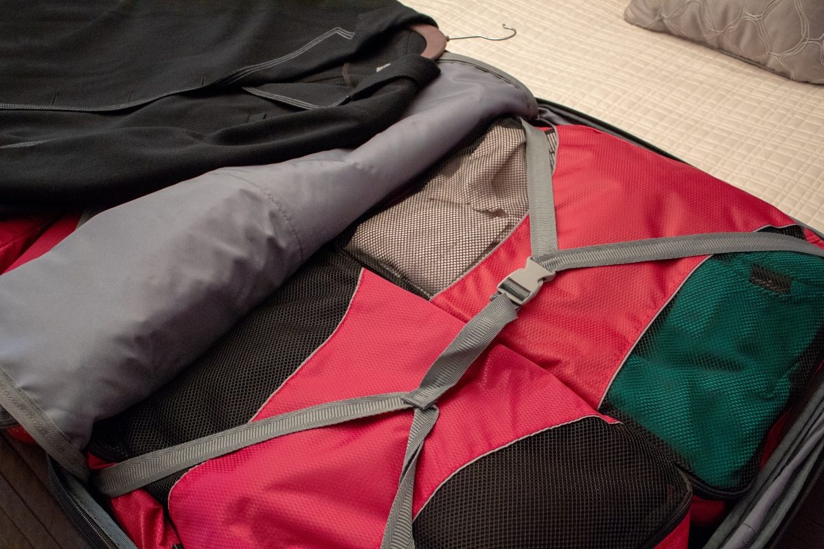 Close-up of packing cubes neatly stacked inside a suitcase