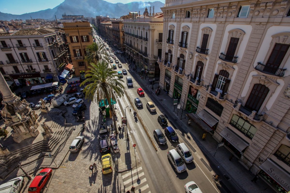 Cars and traffic on a busy street in Palermo, Sicily, Italy