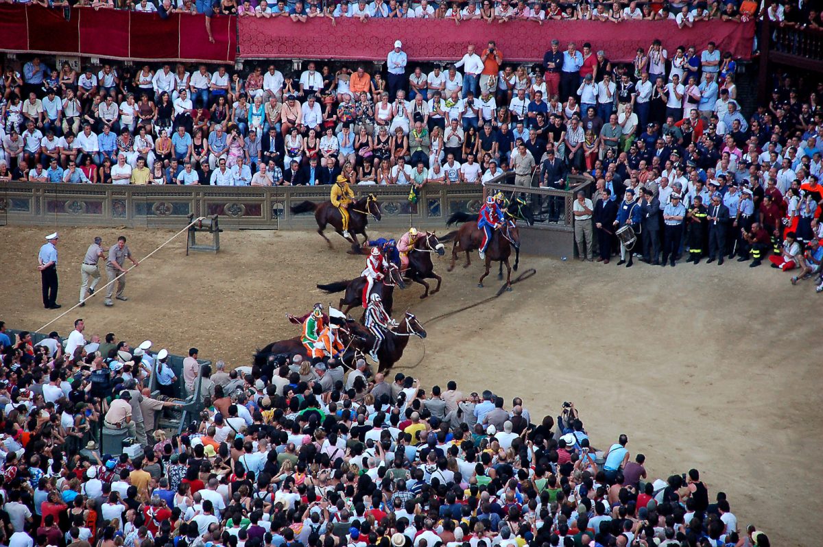 Top view of a horse race during the Palio di Sienna in Siena, Italy