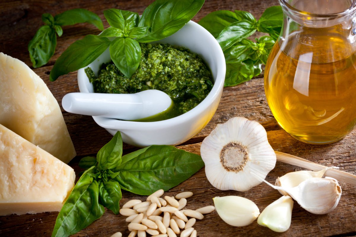 Close-up of pesto alla Genovese and its ingredients