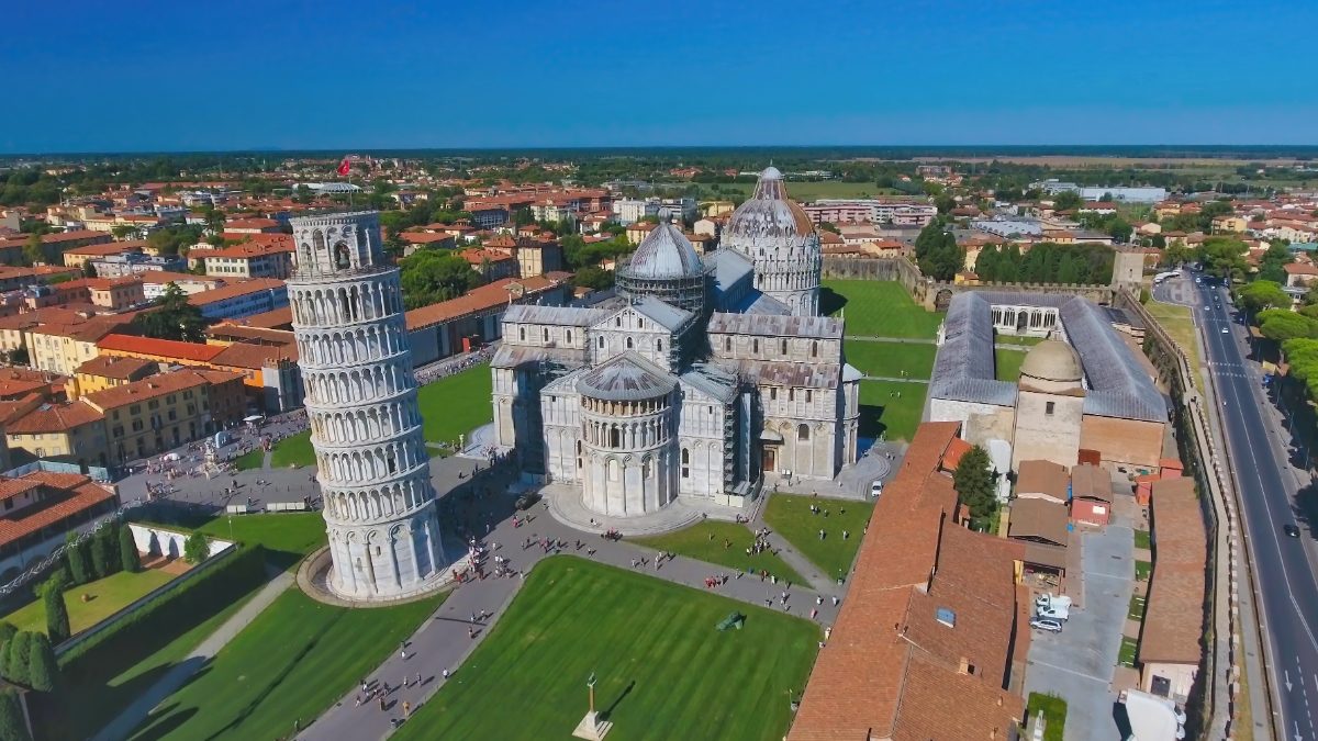 Aerial view of the Leaning tower of Pisa and  Piazza del Duomo at the Piazza dei Miracoli or the Field of Miracles in Pisa, Tuscany