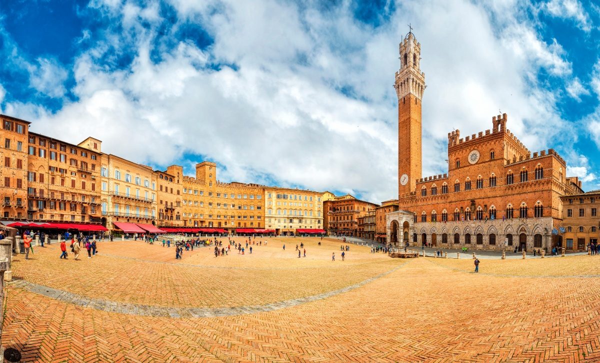 Panorama of the landmarks Piazza del Campo and Torre del Mangia in Siena, Tuscany, Italy