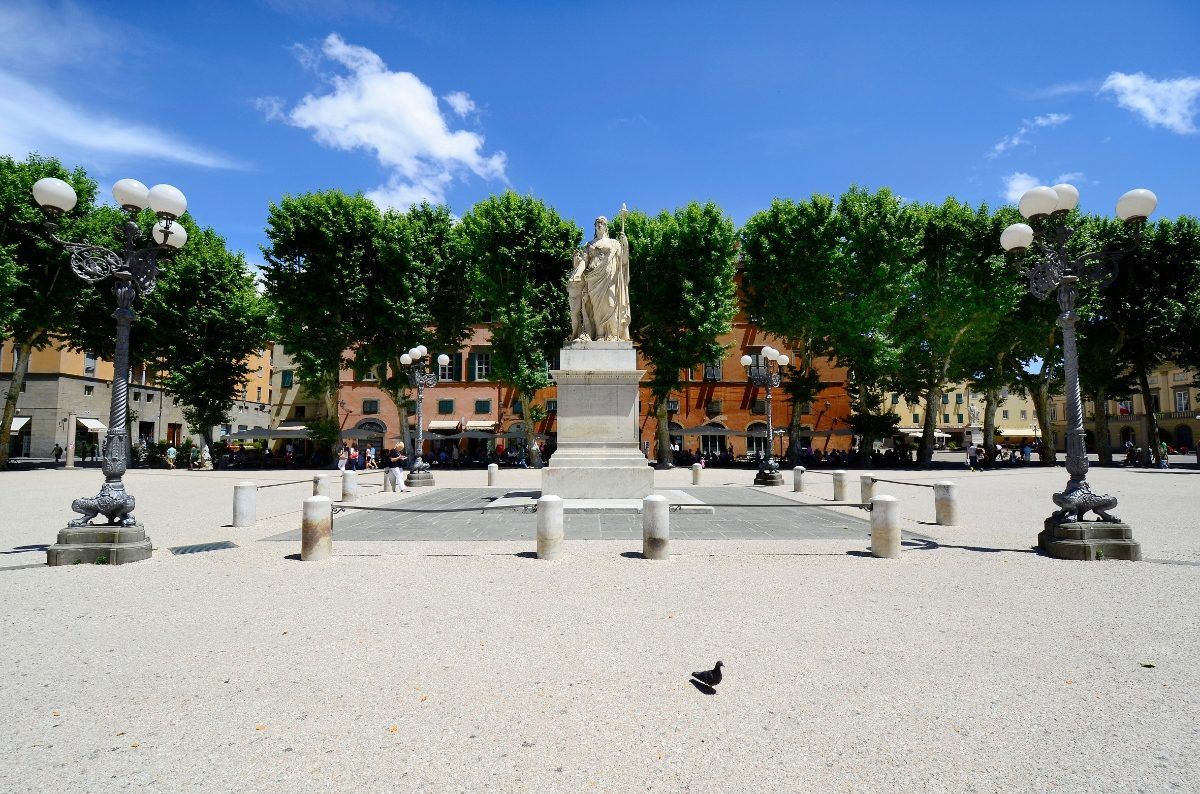 Monument and the square of Piazza Napoleone in Lucca, Italy