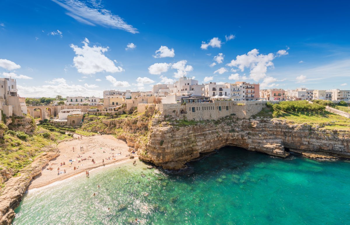 Panoramic view of the beach and townscape of the Polignano A Mare in Apulia, Italy 