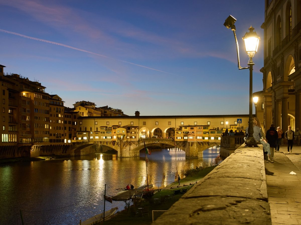 Panoramic view of view of River Arno and Ponte Vecchio night view in Florence, Italy