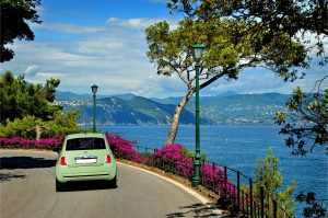 Car on a road trip heading to Portofino, Italy