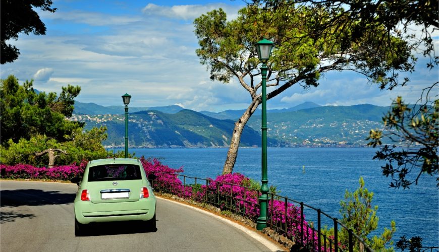 Car on a road trip heading to Portofino, Italy