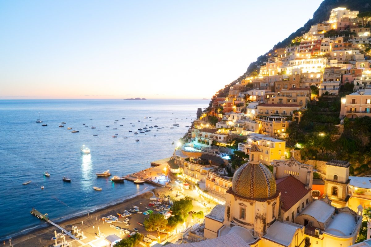 The Bay of Positano, Italy, illuminated by its sparkling night lights