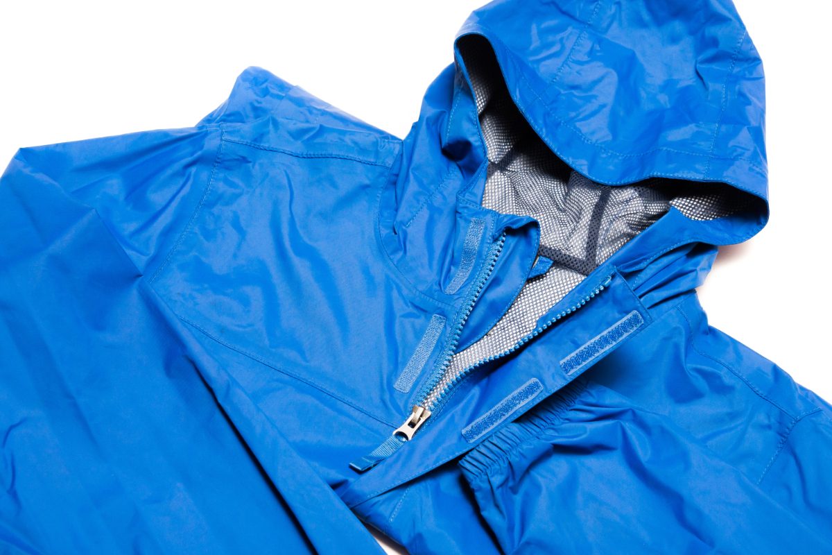 Close-up of a color blue lightweight rain jacket